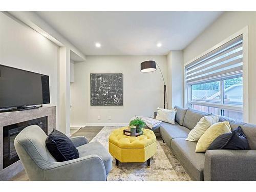 3424 15 Street Sw, Calgary, AB - Indoor Photo Showing Living Room With Fireplace