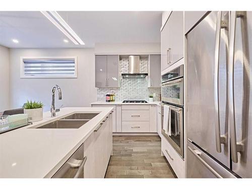 3424 15 Street Sw, Calgary, AB - Indoor Photo Showing Kitchen With Stainless Steel Kitchen With Double Sink With Upgraded Kitchen