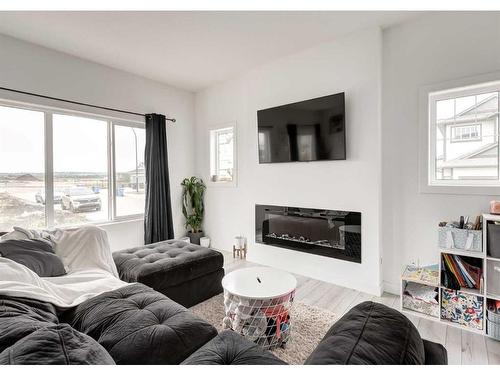 105 Legacy Glen Circle Se, Calgary, AB - Indoor Photo Showing Living Room With Fireplace