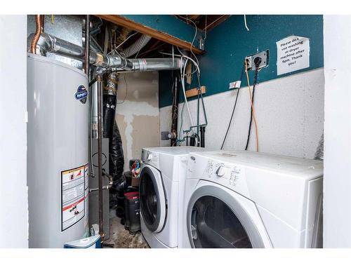 1 Falbury Crescent Ne, Calgary, AB - Indoor Photo Showing Laundry Room