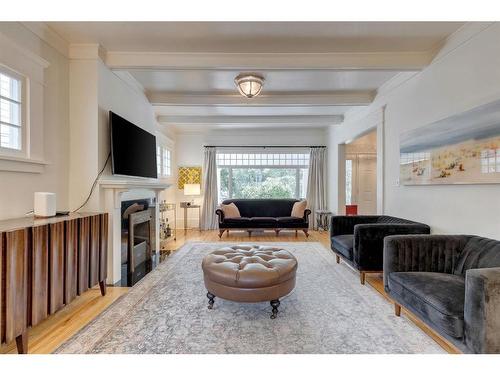 3220 6 Street Sw, Calgary, AB - Indoor Photo Showing Living Room With Fireplace