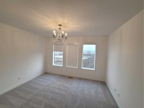 328 Copperhead Way Se, Calgary, AB - Indoor Photo Showing Other Room