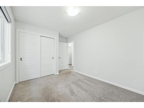 160 Carringham Way Nw, Calgary, AB - Indoor Photo Showing Other Room