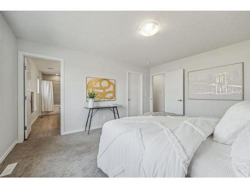 160 Carringham Way Nw, Calgary, AB - Indoor Photo Showing Bedroom