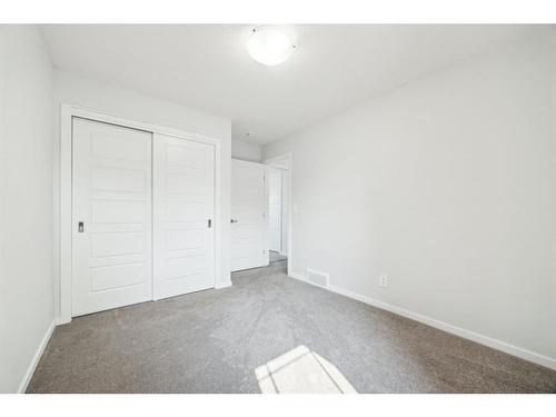 160 Carringham Way Nw, Calgary, AB - Indoor Photo Showing Other Room