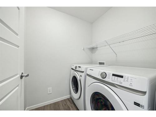 160 Carringham Way Nw, Calgary, AB - Indoor Photo Showing Laundry Room