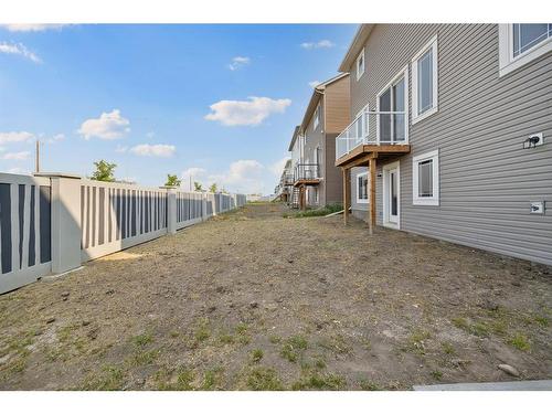 160 Carringham Way Nw, Calgary, AB - Outdoor