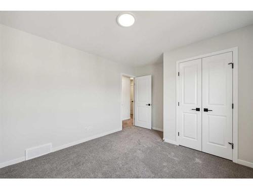 18 Magnolia Court Se, Calgary, AB - Indoor Photo Showing Other Room