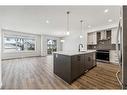 18 Magnolia Court Se, Calgary, AB  - Indoor Photo Showing Kitchen With Upgraded Kitchen 