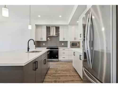 18 Magnolia Court Se, Calgary, AB - Indoor Photo Showing Kitchen With Upgraded Kitchen