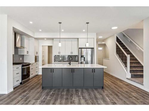 18 Magnolia Court Se, Calgary, AB - Indoor Photo Showing Kitchen With Upgraded Kitchen