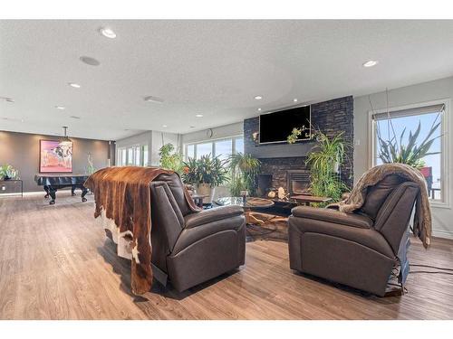 260011 Mountain Ridge Place, Rural Rocky View County, AB - Indoor Photo Showing Living Room With Fireplace