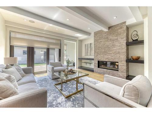 1821A Broadview Road Nw, Calgary, AB - Indoor Photo Showing Living Room With Fireplace