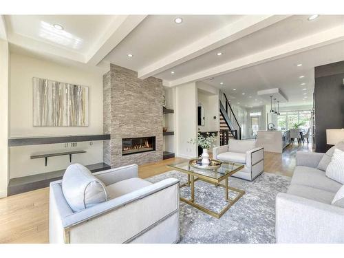 1821A Broadview Road Nw, Calgary, AB - Indoor Photo Showing Living Room With Fireplace