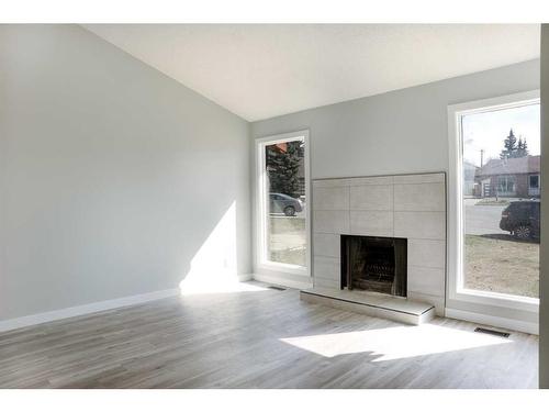 343 Ranchview Mews Nw, Calgary, AB - Indoor Photo Showing Living Room With Fireplace