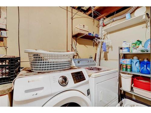 940 Rundlecairn Way Ne, Calgary, AB - Indoor Photo Showing Laundry Room