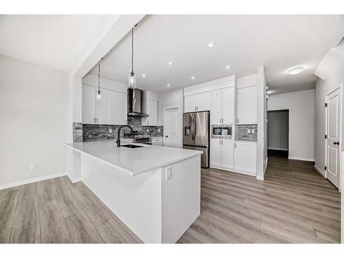 31 Royston Heath Nw, Calgary, AB - Indoor Photo Showing Kitchen With Upgraded Kitchen