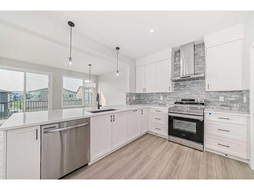 31 Royston Heath Nw, Calgary, AB - Indoor Photo Showing Kitchen With Upgraded Kitchen