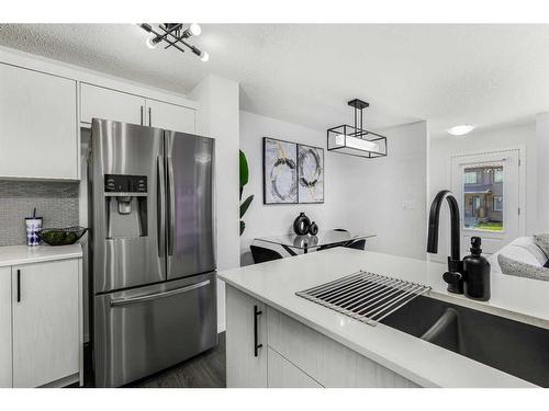 1482 148 Avenue Nw, Calgary, AB - Indoor Photo Showing Kitchen With Stainless Steel Kitchen With Double Sink