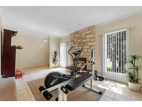 54 Marbrooke Circle Ne, Calgary, AB - Indoor Photo Showing Gym Room