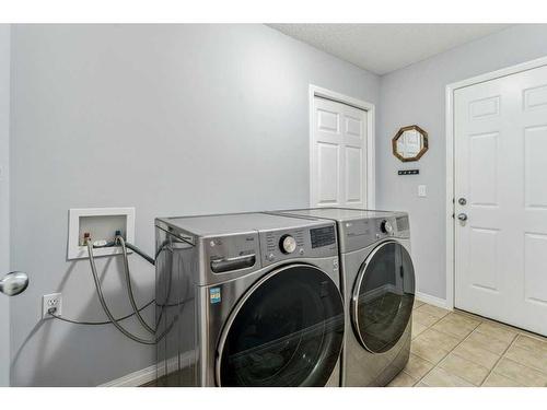 195 West Creek Landing, Chestermere, AB - Indoor Photo Showing Laundry Room