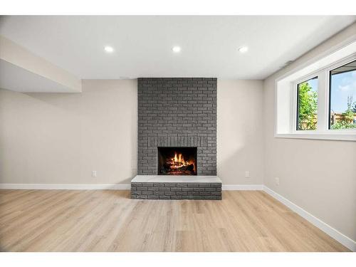 956 Bracewood Rise Sw, Calgary, AB - Indoor With Fireplace