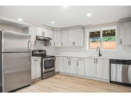 956 Bracewood Rise Sw, Calgary, AB - Indoor Photo Showing Kitchen With Upgraded Kitchen