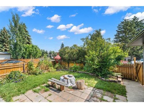 956 Bracewood Rise Sw, Calgary, AB - Outdoor With Backyard