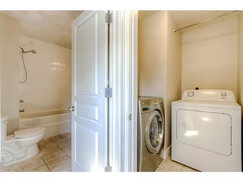 174-77 Glamis Green Sw, Calgary, AB - Indoor Photo Showing Laundry Room