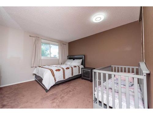 35 Falton Drive Ne, Calgary, AB - Indoor Photo Showing Bedroom