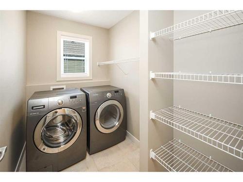 199 Everhollow Street Sw, Calgary, AB - Indoor Photo Showing Laundry Room