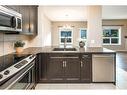 199 Everhollow Street Sw, Calgary, AB  - Indoor Photo Showing Kitchen With Double Sink With Upgraded Kitchen 