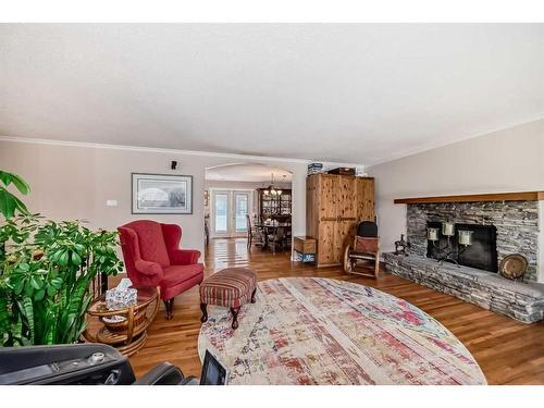 47 Lake Wapta Rise Se, Calgary, AB - Indoor Photo Showing Living Room With Fireplace