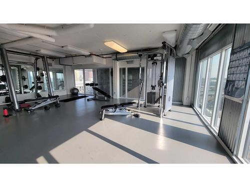 1202-450 8 Avenue Se, Calgary, AB - Indoor Photo Showing Gym Room