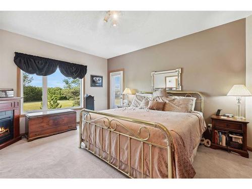 220 Country Lane Drive, Rural Rocky View County, AB - Indoor Photo Showing Bedroom