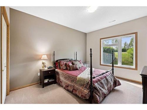 220 Country Lane Drive, Rural Rocky View County, AB - Indoor Photo Showing Bedroom