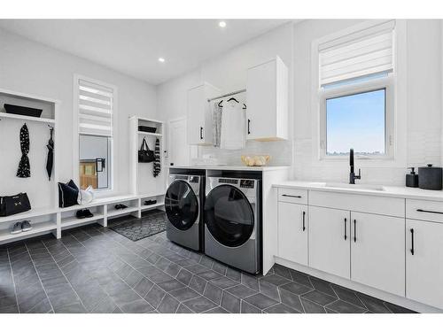 16225-Hamilton Heights Mews, Rural Foothills County, AB - Indoor Photo Showing Laundry Room