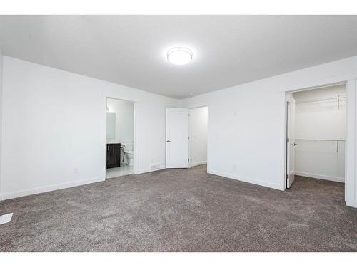 1004 Iron Landing Way, Crossfield, AB - Indoor Photo Showing Other Room