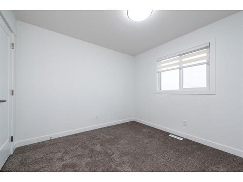 1004 Iron Landing Way, Crossfield, AB - Indoor Photo Showing Other Room