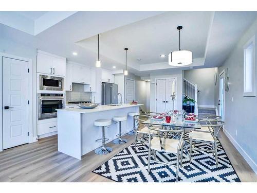 2-2633 1 Avenue Nw, Calgary, AB - Indoor Photo Showing Kitchen With Upgraded Kitchen