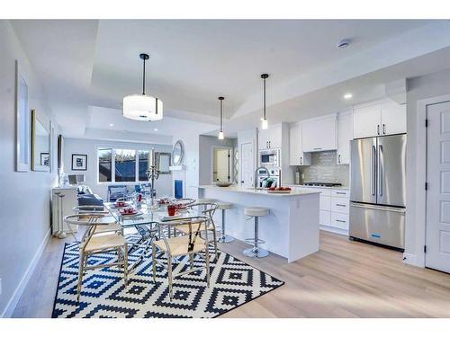 2-2633 1 Avenue Nw, Calgary, AB - Indoor Photo Showing Kitchen With Upgraded Kitchen