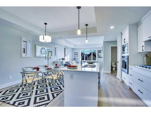 2-2633 1 Avenue Nw, Calgary, AB - Indoor Photo Showing Kitchen With Upgraded Kitchen