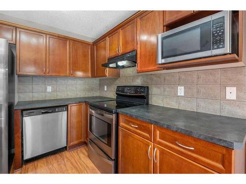 81 Royal Elm Road Nw, Calgary, AB - Indoor Photo Showing Kitchen