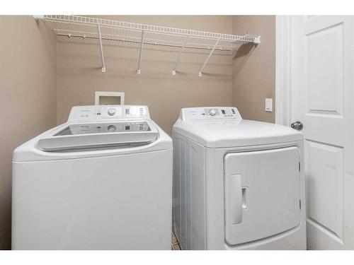 81 Royal Elm Road Nw, Calgary, AB - Indoor Photo Showing Laundry Room