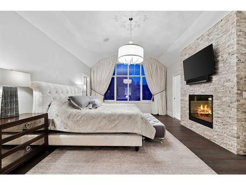 1613 7 Street Nw, Calgary, AB - Indoor Photo Showing Bedroom With Fireplace