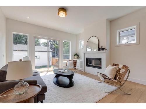 1635 Bowness Road Nw, Calgary, AB - Indoor Photo Showing Living Room With Fireplace