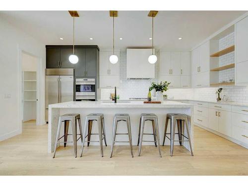 120 25 Avenue Nw, Calgary, AB - Indoor Photo Showing Kitchen With Upgraded Kitchen