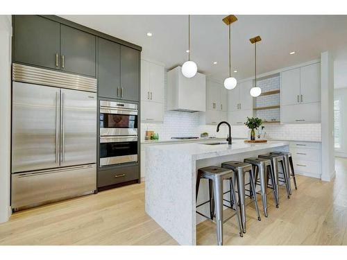 120 25 Avenue Nw, Calgary, AB - Indoor Photo Showing Kitchen With Upgraded Kitchen