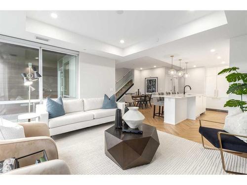 108-8445 Broadcast Avenue Sw, Calgary, AB - Indoor Photo Showing Living Room