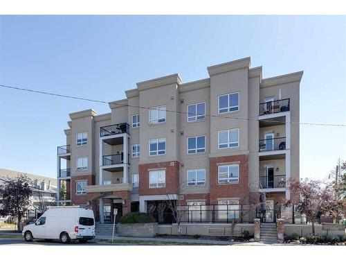 309-1108 15 Street Sw, Calgary, AB - Outdoor With Balcony With Facade